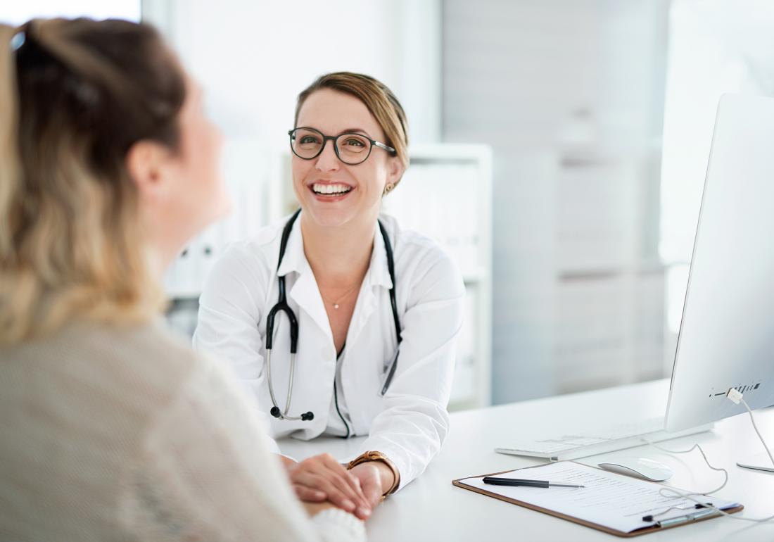 Doctor talking with patient