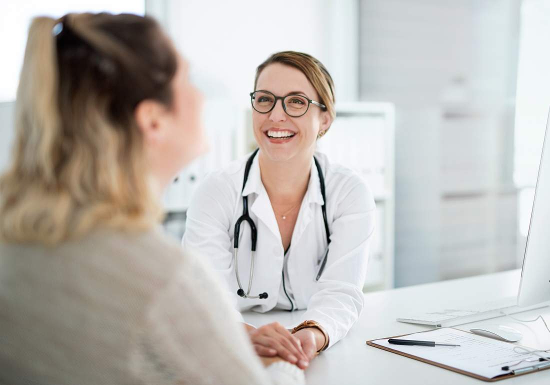 Doctor talking with patient