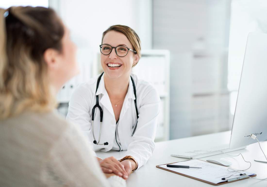 Doctor talking with patient