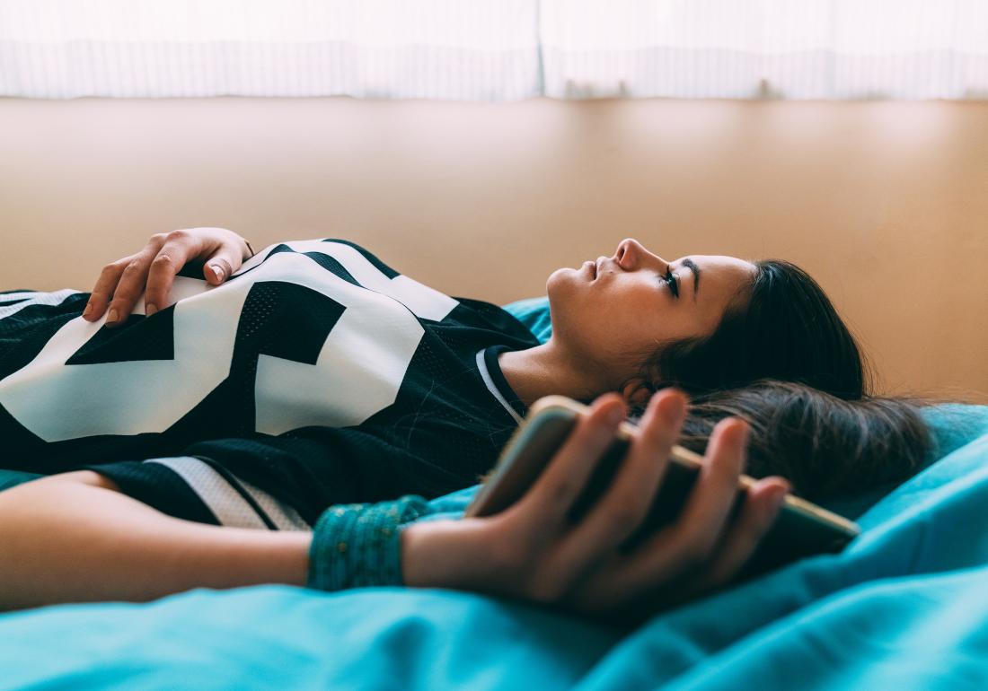 Girl laying on bed