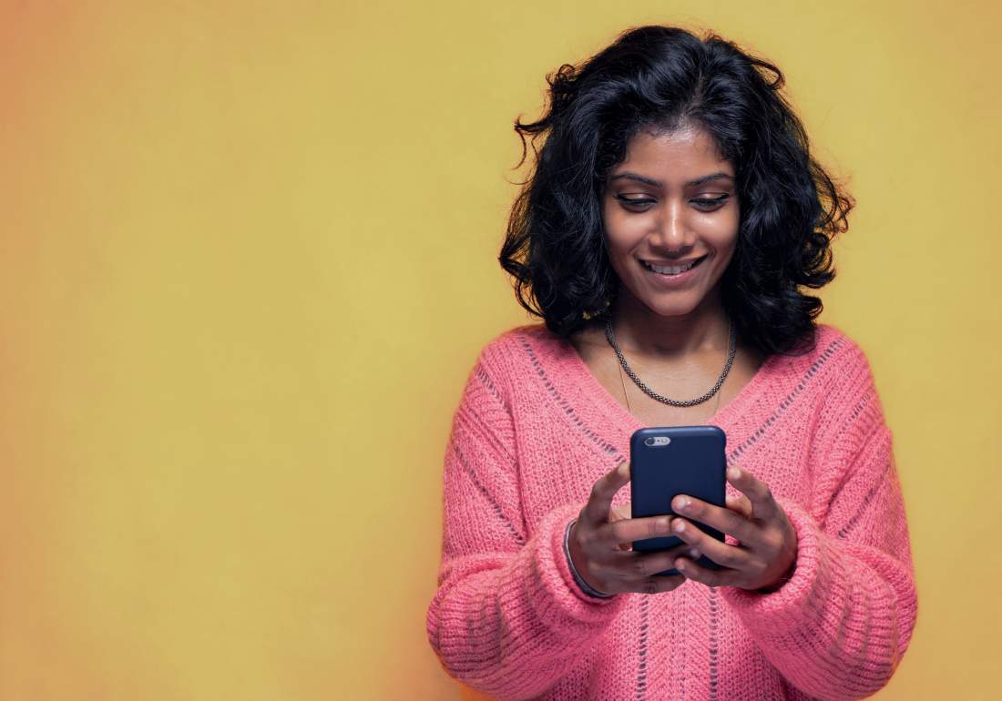 Young girl on phone looking for endo diagnosis