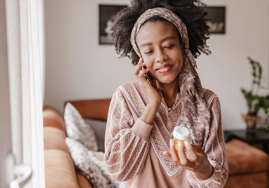 Woman taking medication for endo symptoms