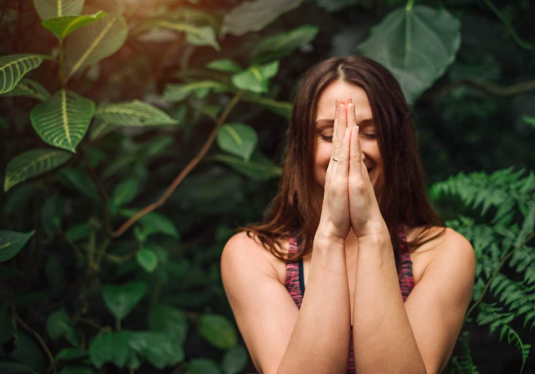 Woman meditating for endo symptoms
