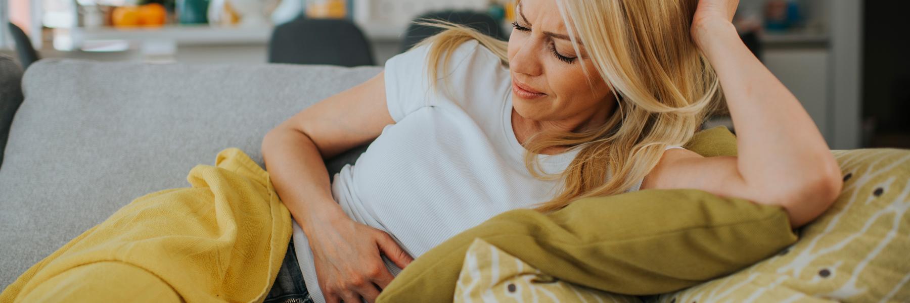 Woman showing signs of discomfort with endo pelvic pain