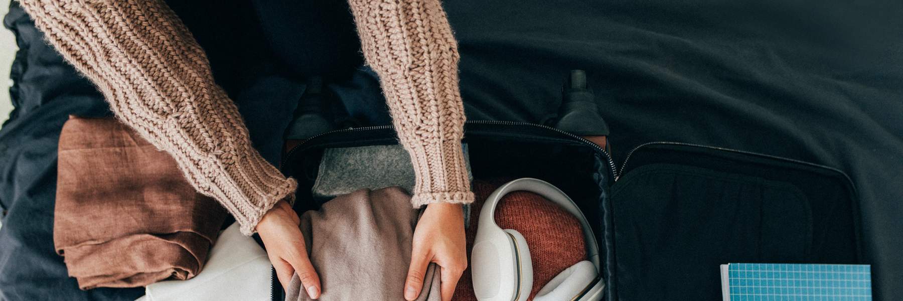 Loading surgery essentials into suitcase
