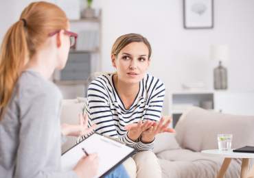 Woman holding hands out frustratedly