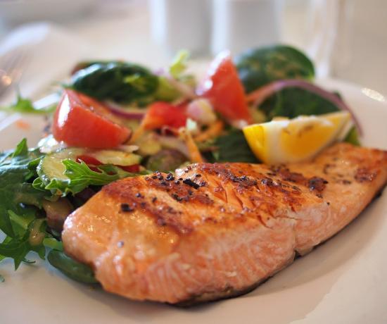 Salmon on a plate with salad