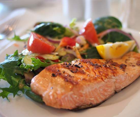Salmon on a plate with salad