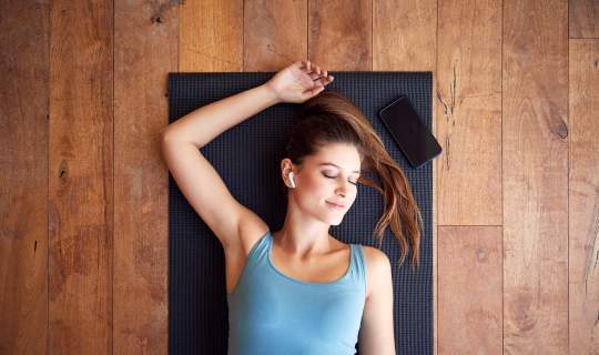 Girl listening to meditation guide