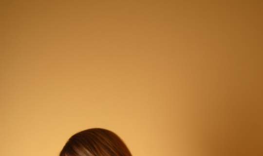Woman holding water bottle to treat endometriosis