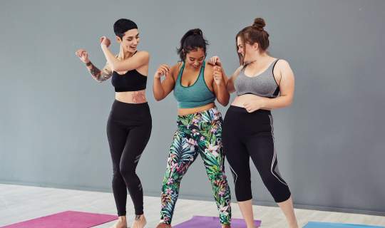 Woman dancing in gym 