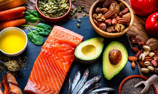 Healthy food selection containing omega 3 fish nuts avocado