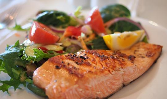 Salmon on a plate with salad