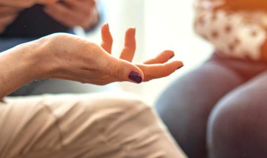 Support group sitting and talking